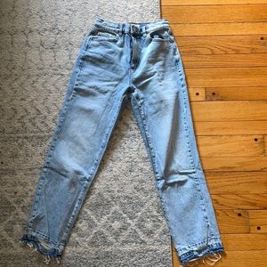 Garage denim high waisted jeans, medium-light wash, rips at the bottom